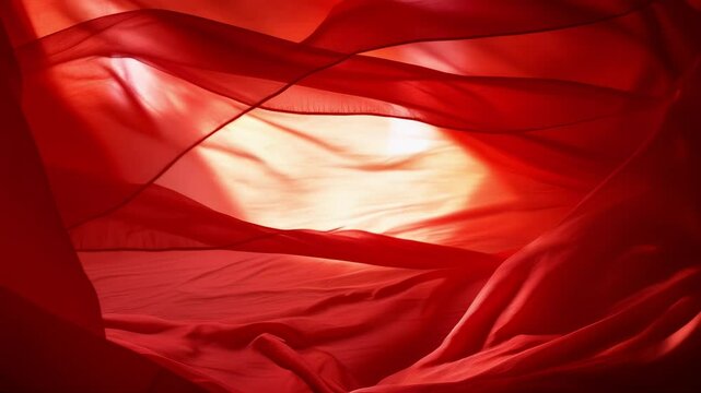 Red cloth flowing in wind in slow motion
