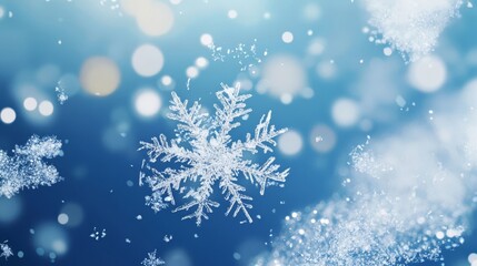 Abstract background with snowflakes and bokeh lights on a blue background. Christmas concept. Snowy winter scene.