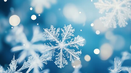 Abstract background with snowflakes and bokeh lights on a blue background. Christmas concept. Snowy winter scene.