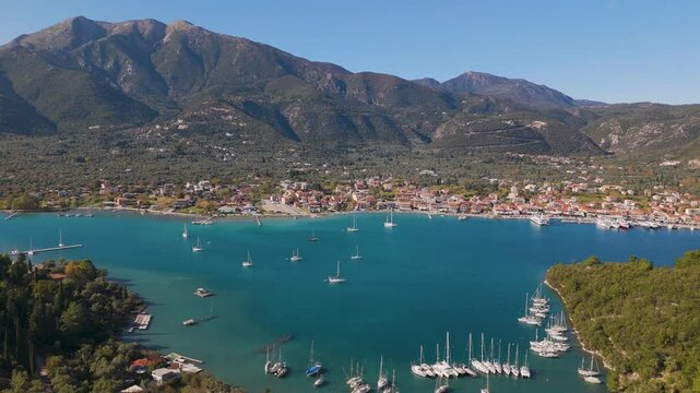 Aerial drone view of the coastal town of Nydri on the island of Lefkada in Greece.