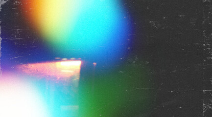 grainy colorful warm blue red orange light leaks on black background with dust texture. abstract damaged scratched retro film analog effect for using over photos as overlay or screen filter