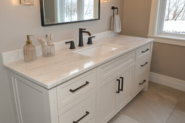 Fototapeta premium Elegant White Bathroom Vanity with Double Sinks and Black Fixtures