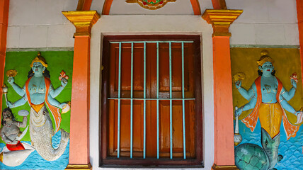 Intricate sculptures of Kachhya and Machhya carved on Dakhinpat Satra, Majuli Island, Assam, India.