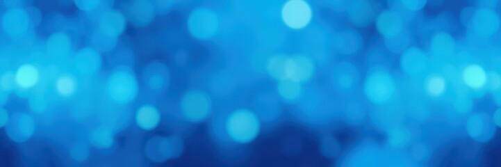 Obraz premium Bright blue bokeh lights create a dreamy atmosphere in a nighttime setting with a soft focus effect