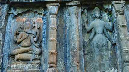 Carvings of Lord Ganesha and Lord Vishnu on Joysagar Dol, Sivasagar, Assam, India.