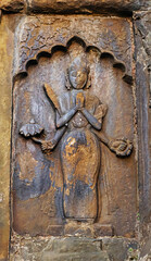 Sculpted carvings of Hindu saints on the Joysagar Temple, Sivasagar, Assam, India.