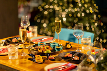 Mexican food and drinks. Restaurant service. A festive table set for Christmas and New Year