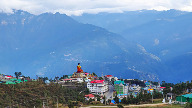 Awe-inspiring view of the colossal Buddha statue overlooking Tawang town, Tawang, Arunachal Pradesh, India.