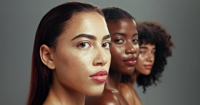 Face, diversity and group of women with cosmetics, beauty and natural makeup in studio together. Skincare, dermatology and girl friends with solidarity, empowerment and confidence on grey background.