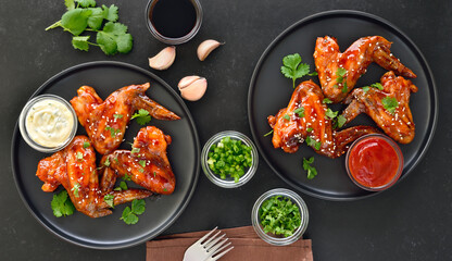 Baked chicken wings on plate