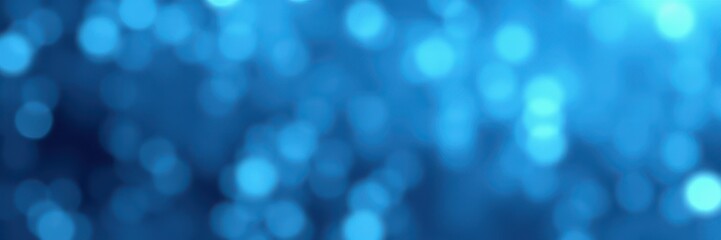Glimmering blue bokeh lights create a dreamy atmosphere for festivities and celebrations