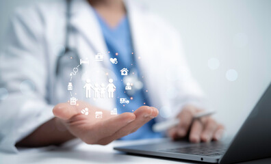 Doctor holding virtual icons representing healthcare services. Family, health, and medical icons are floating above the doctor's hand, signifying patient-centered care and health technology