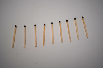 match, matches, wood, isolated, fire, white, matchstick, light, stick, burn, object, danger, wooden, flame, matchbox, matchsticks, flammable, close-up, group, red, macro, heap, closeup, heat, objects