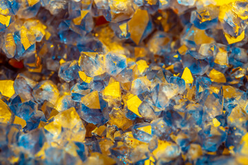 Multi-colored crystal mineral stone. Gems. Mineral crystals in the natural environment. Texture of precious and semiprecious stones. shiny surface of precious stone