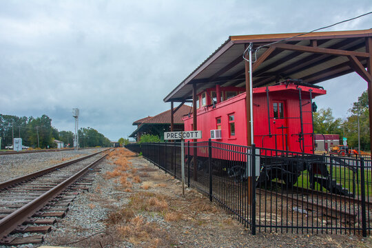 Prescott, USA - October 26, 2023 - Prescott and Northwestern Railroad Caboose No 3 on display outside of the Nevada County Depot and Museum in Prescott, Arkansas