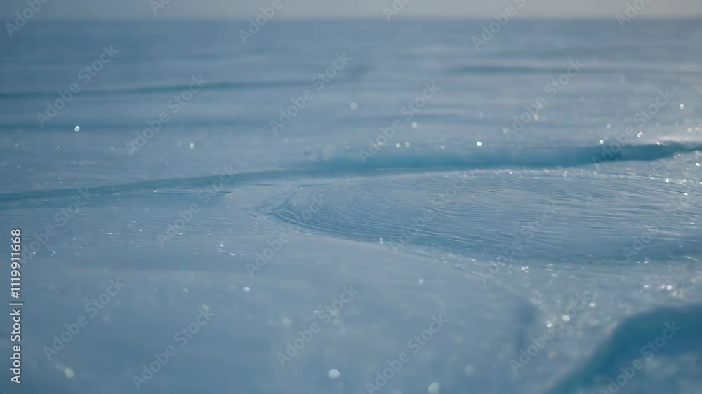 Poster close-up of snow texture with soft ripples and sparkles under sunlight, creating a natural abstract 