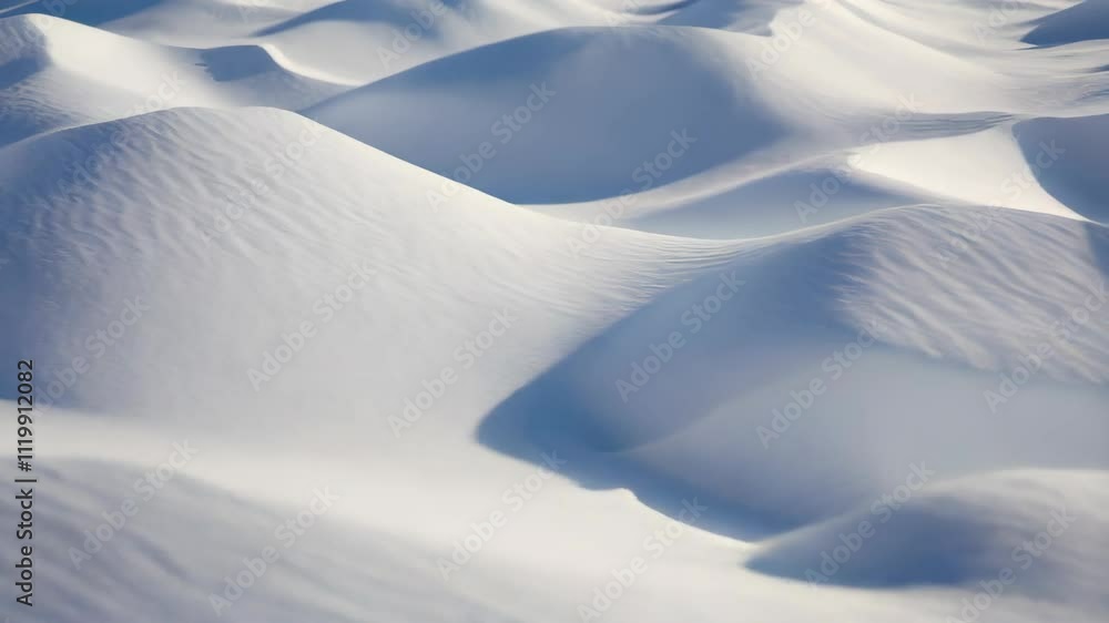 Poster snow dunes with gentle curves under soft lighting and a clear sky, creating a tranquil winter scener