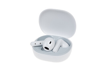 White wireless headphones, isolated. New earphones on white background. New technologies.