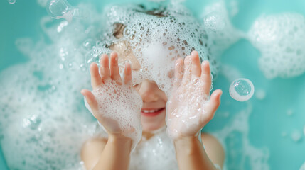 Fototapeta premium a kid in bathroom washing her face with bubble soap