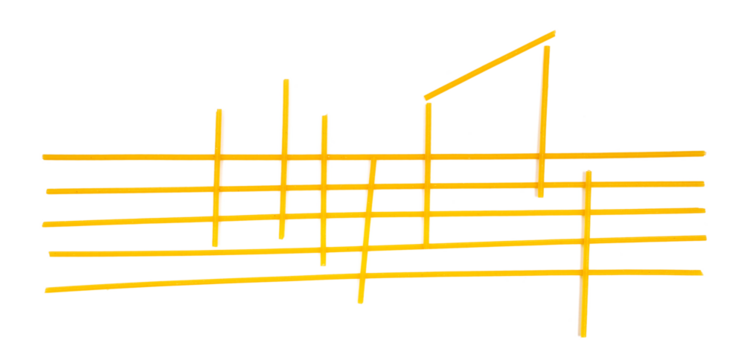 Integral spaghetti, yellow pasta in shape music scales isolated on white, clipping