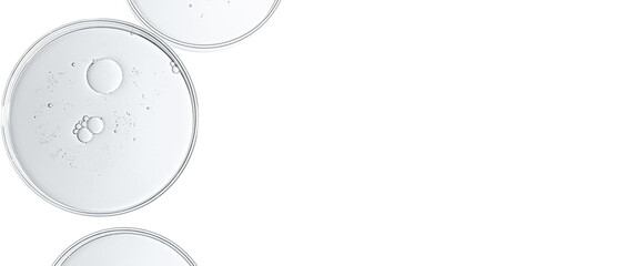 The texture of a cosmetic serum or body gel in a Petri dish.