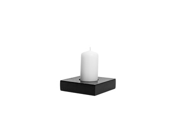 White Candle on Black Wooden Stand Isolated on White
