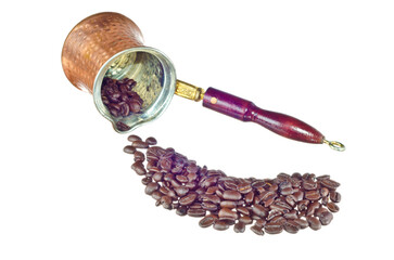 Turkey Cezve with coffee beans isolated on white background.