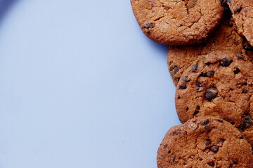 chocolate chip cookies on light blue background