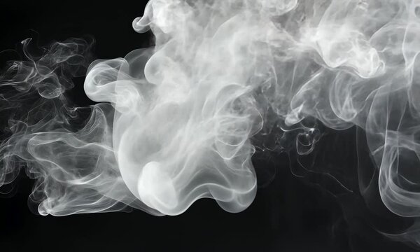 A swirling formation of white smoke against a dark background, creating an abstract and ethereal visual effect.