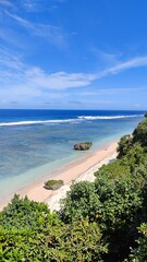 The stunning blue water and white sand beaches on Samoa in the Pacific Ocean