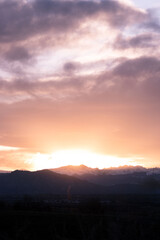 Blossoms and Peaks: A Vibrant Spring Sunset in the Rockies
