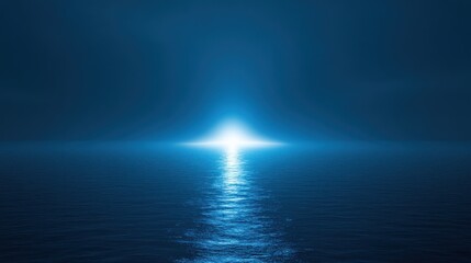 A serene ocean scene illuminated by a bright light on the horizon.