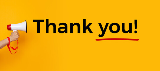 Hand with a megaphone and a thank you text	