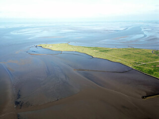 Aerial view of the tidal mudflats and channels of the Eemsdelta and Dollard, Groningen, The Netherlands