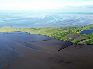 Aerial view of the tidal mudflats and channels of the Eemsdelta and Dollard, Groningen, The Netherlands