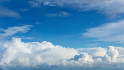 Obraz premium Blue Sky with Soft White Clouds Texture