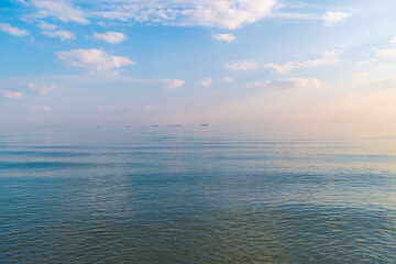 Blue sea and blue sky. Beautiful simple seascape. Morning on the sea beach. Nature background.