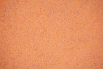 Textured Plastered Surface in Red-Orange Color