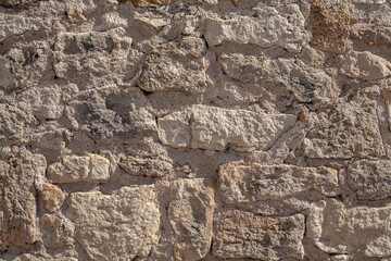 Fototapeta premium Ancient Beige Stone Wall Texture