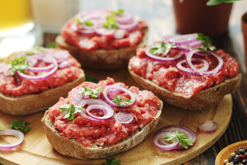 Traditional German sandwiches with minced meat Mettbroetchen	