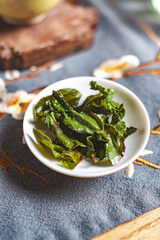 A Collection of Fresh Green Herbs Beautifully Arranged in a Bowl for Culinary Use