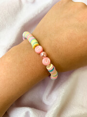 Handmade Pearl Bracelet Demonstrated by Little Girl