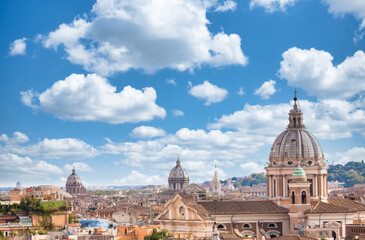 Fototapeta premium Rome, Italy. Urban landscape, blue sky with clouds, church exterior architecture