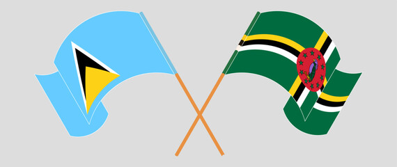 Crossed and waving flags of Saint Lucia and Dominica. Vector illustration