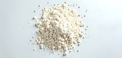 a pile of white flour is on the white table