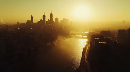 Fototapeta premium Breathtaking Aerial View of a City Skyline at Sunset Over a River with Golden Hues and Silhouetted Buildings Reflecting in the Water, Evoking Tranquility and Beauty
