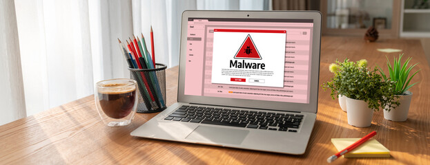 Cyber attacking concept. Malware alert showing on computer screen display scam and threat detection...