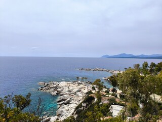 A panoramic view of the wild beauty of the Sardinian coast, a calm and romantic atmosphere