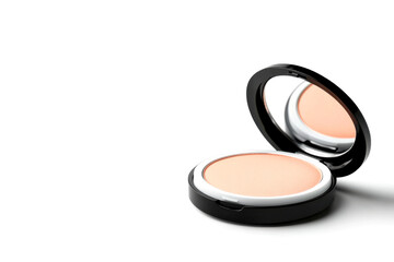 A sleek, black compact containing a smooth, peach-toned powder, reflecting light elegantly in a minimalist setting.