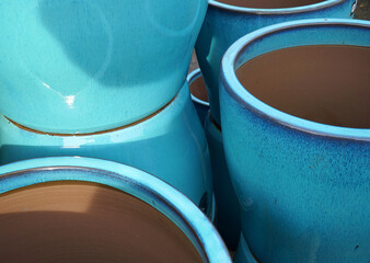 Turquoise plant pots close up background